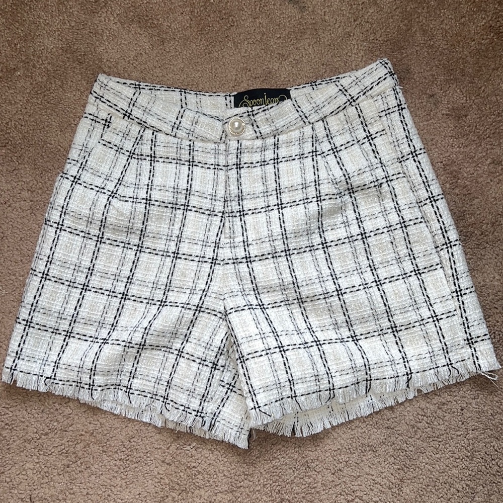BLACK AND WHITE tweed shorts with fringe